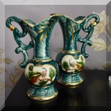 P06. Pair of peacock ewers. 